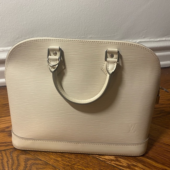 Louis Vuitton
Alma Handbag white Epi Leather PM - Picture 3 of 16